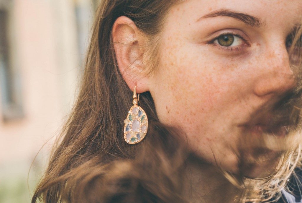 woman wearing a diamond earring